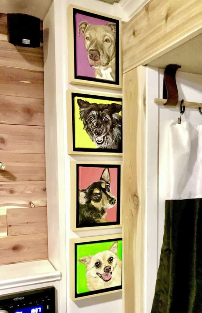 Small 6x6 pet portraits hanging on an RV wall